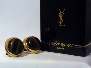 Yves Saint Laurent round goldtone clip earrings from the Safari line original box d .JPG