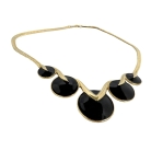 Trifari Amerika, vintage goudkleurig collier met zwart emaille discs, 80er jaren.