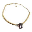 B.E. Cook London vintage goudkleurig collier met een grote facet geslepen Amethist kleurige glassteen, 80er jaren.